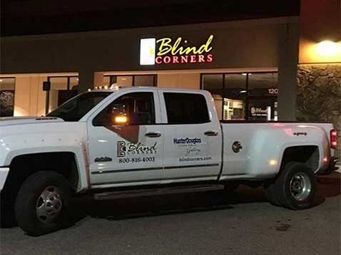 Company truck parked outside the business